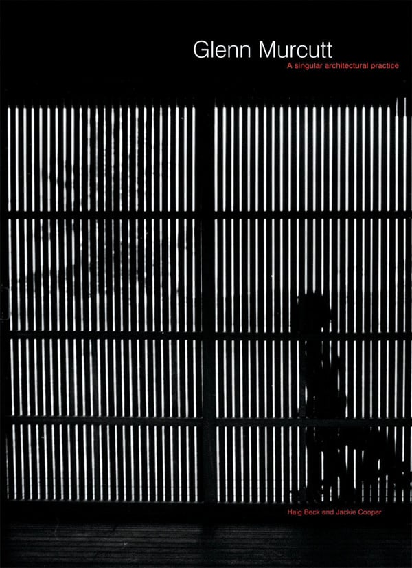 Large white industrial warehouse building, under night sky, STEEL CITIES The Architecture of Logistics in Central and Eastern Europe in black font on pale grey cover.