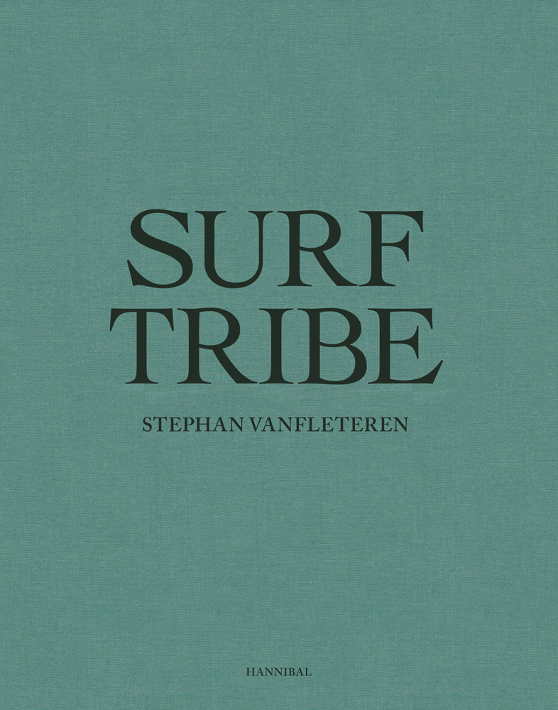 Capitalised dark green font to centre of paler green cover of 'Surf Tribe', by Hannibal Books.