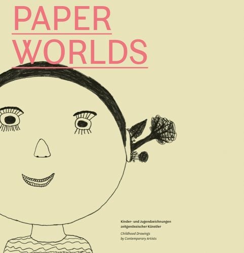 Beige cover of Paperworlds with a child's drawing of face. Pink capitalised font above. Published by Verlag Kettler.