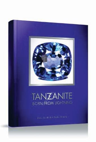 Blue book cover of Tanzanite, Born from Lightning, featuring a large blue jewel. Published by Watchprint.com.