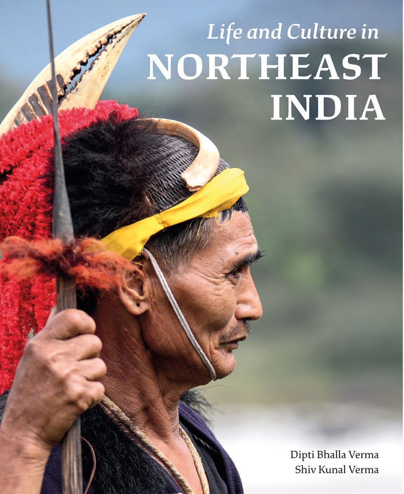 Book cover of Life and Culture in Northeast India, with a Tribesman wearing bone headdress. Published by Abbeville Press.