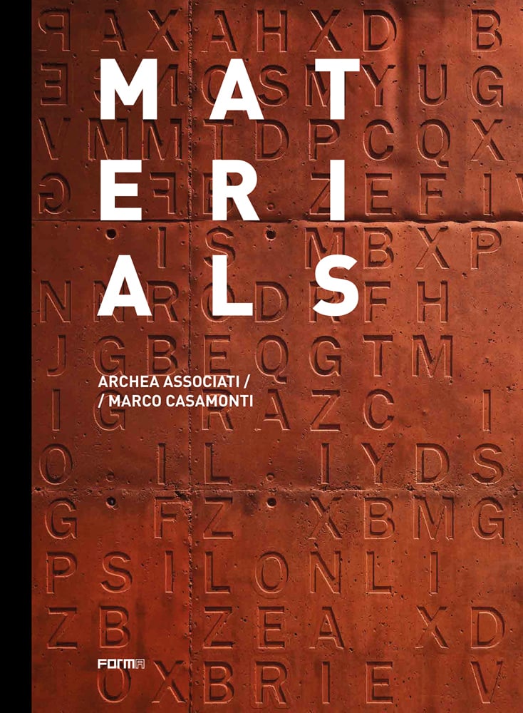 Terracotta brick with letter shapes, on cover of 'Materials, Archea Associati / Marco Casamonti', by Forma Edizioni.