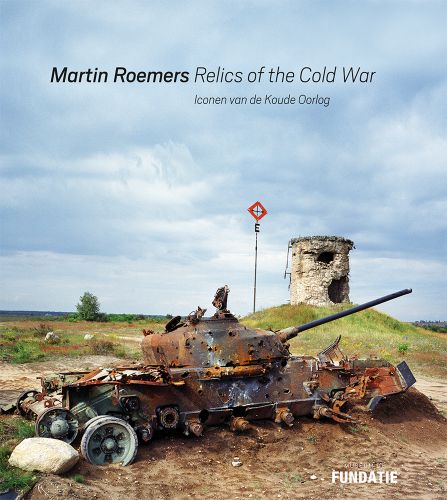 Book cover of Martin Roemers, Relics of the Cold War, featuring an abandoned, rusted tank on coastline. Published by Waanders Publishers.