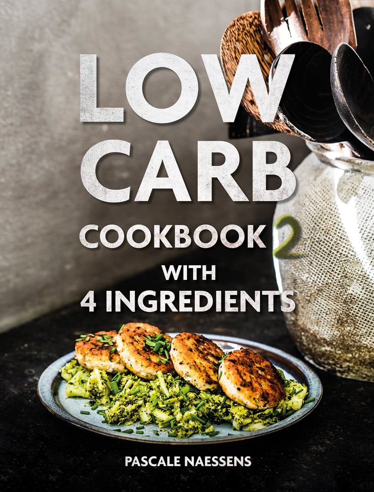 Plate of fish cakes on bed of green cabbage, pot of utensils to side, on cover of 'Low Carb Cookbook with 4 Ingredients 2, by Lannoo Publishers.