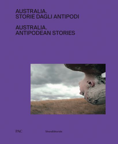 Head and shoulders of person upside down, facing landscape with dark clouds, on purple cover, AUSTRALIA ANTIPODEAN STORIES in black font above.