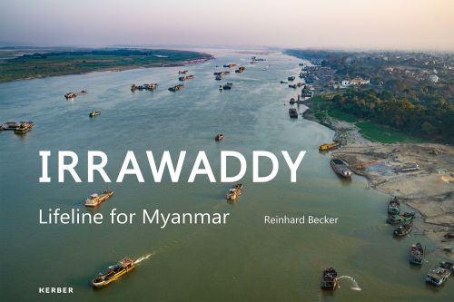 Aerial shot of boats sailing down the Irrawaddy river in Myanmar, IRRAWADDY Lifeline For Myanmar in white font to lower left.