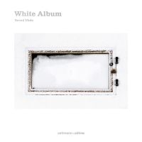Book cover of White Album: The colours of snow, with an aerial view of a snow covered object. Published by Seltmann Publishers.