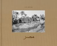 Book cover of Egypt: In the Mirror of Timelessness, with an Egyptian landscape with buildings and a river. Published by Seltmann Publishers.