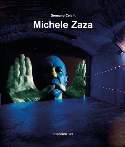 Human face painted blue with yellow nose, green hands, Germano Celant Michele Zaza in white font above