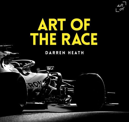 Black cover with rear angled shot of dark Mercedes F1 racing car to lower left with Art of the Race in yellow font and Darren Heath in white font below