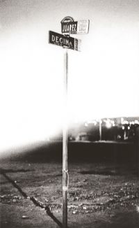 Book cover of Ciudad Juárez, with a lone sign post to Juárez. Published by Seltmann Publishers.