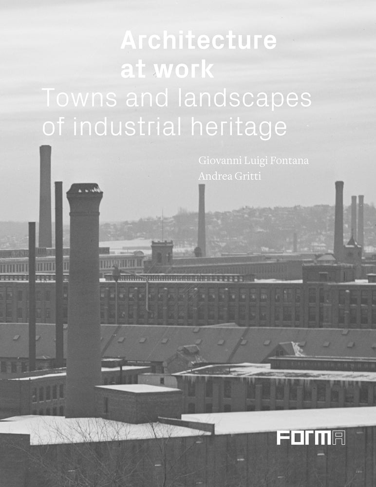 Industrial landscape with tall chimneys and Architecture at Work in white font above