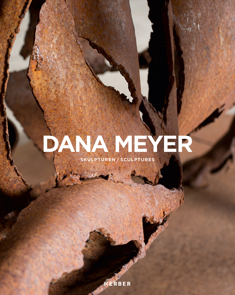 Close up photo of section of forged rusted steel sculpture with Dana Meyer in white font in centre