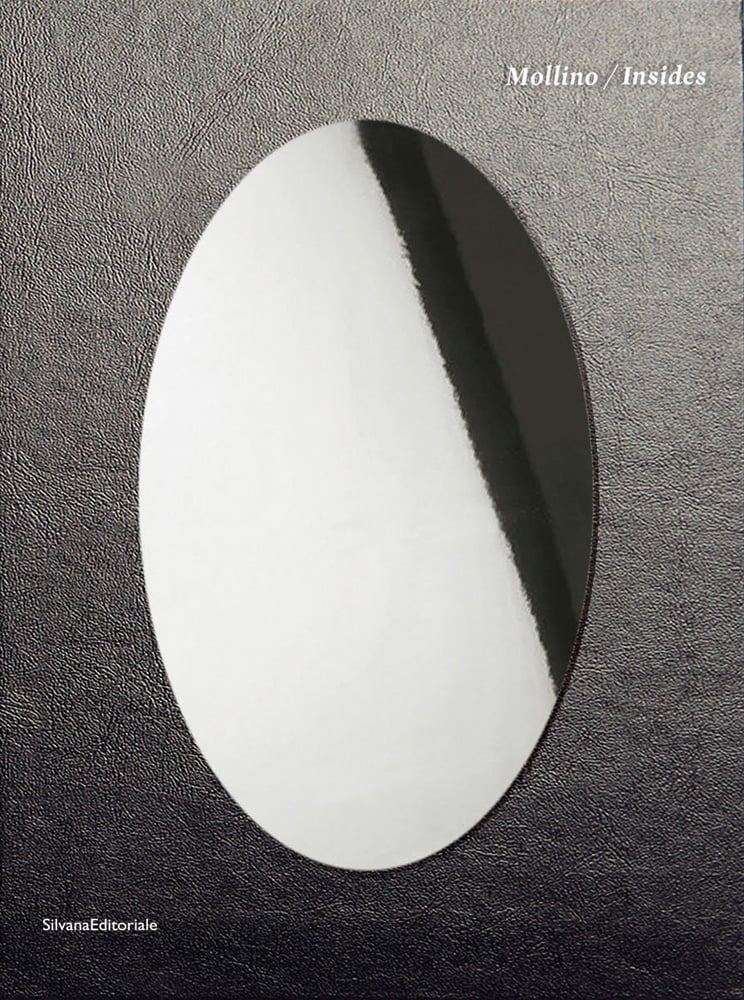 Oval mirror to centre of black vinyl cover, Mollino/Insides in white font to top right.