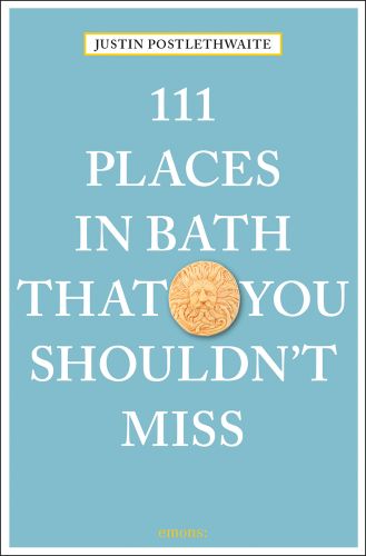 Male Medusa Gorgon head sundial near centre of pale blue cover of '111 Places in Bath That You Shouldn't Miss', by Emons Verlag.