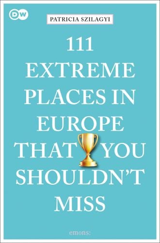 Golden double handled trophy near centre of turquoise cover of '111 Extreme Places in Europe That You Shouldn't Miss', by Emons Verlag.