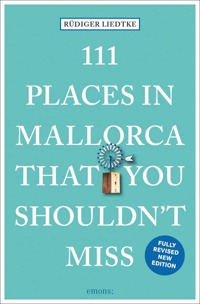 Windmill near centre of green cover of '111 Places in Mallorca That You Shouldn't Miss', by Emons Verlag.