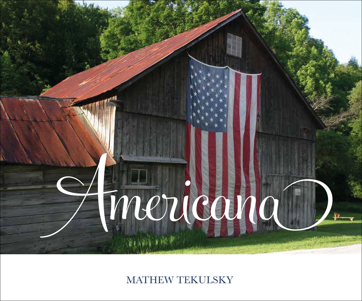 Landscape photograph of American barn with American flag draped across the front, Americana in white font, Mathew Teklusky in blue font on bottom white banner.