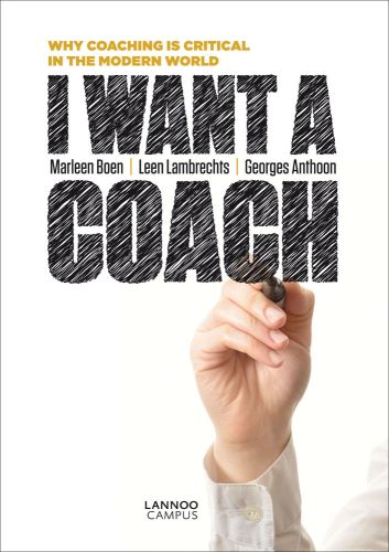 Hand writing with black marker pen, on cover of 'I Want a Coach', by Lannoo Publishers.