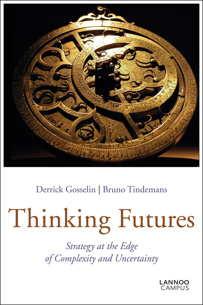 Gold astrolabe on cover of 'Thinking Futures, Strategy at the Edge of Complexity and Uncertainty', by Lannoo Publishers.