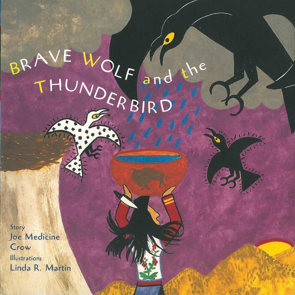 Book cover of Brave Wolf and the Thunderbird, with a native American holding large bowl of rainwater on head, with large black crow above. Published by Abbeville Press.