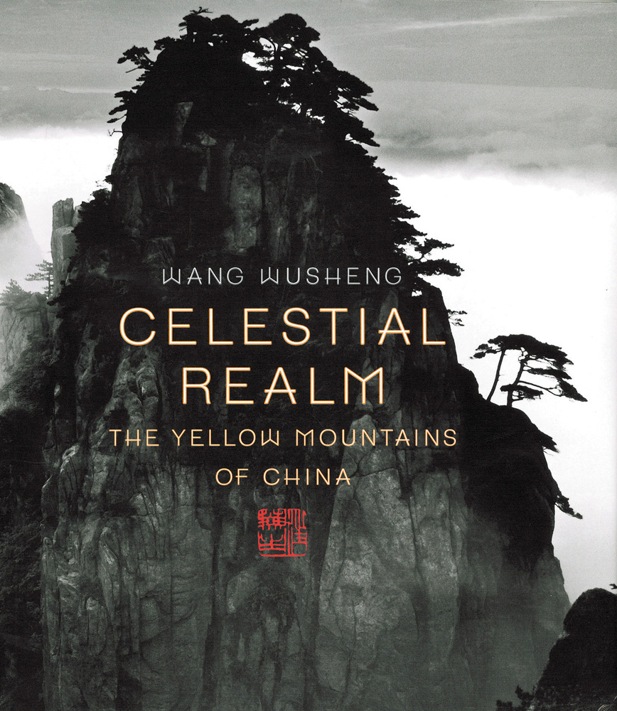 Book cover of Celestial Realm: The Yellow Mountains of China, featuring tree silhouettes on mountain edge. Published by Abbeville Press.