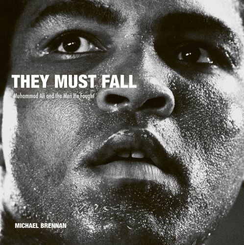 Heavyweight champion Muhammad Ali with perspiration on face, on cover of 'They Must Fall, Muhammad Ali and the Men He Fought, Michael Brennan', by ACC Art Books.