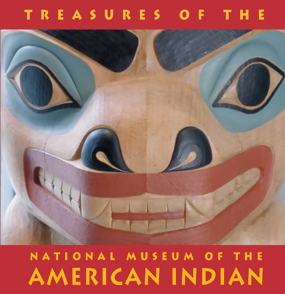 Book cover of Treasures of the National Museum of the American Indian: Tiny Folio, featuring a close up carved cedar totem pole with large eyes and teeth. Published by Abbeville Press.