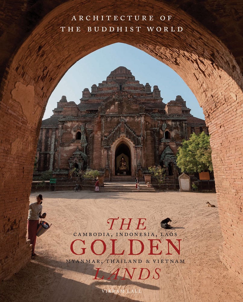 Archway entrance to Dhammayangyi Temple in Myanmar, figure carrying basket, to left, THE GOLDEN LANDS in red font below.