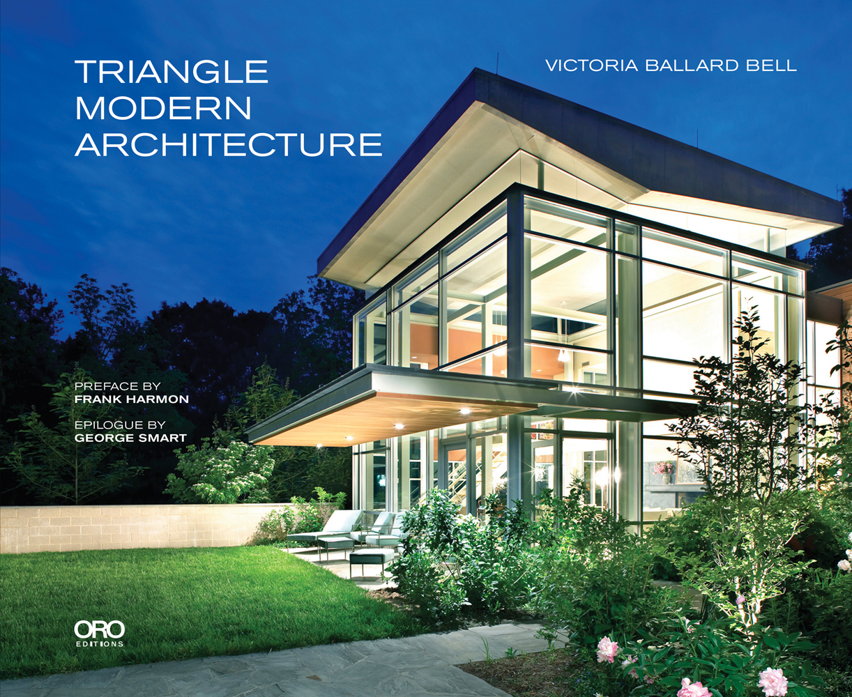 Modern glass residential building, under night sky, landscaped garden, TRIANGLE MODERN ARCHITECTURE in white font to top left.