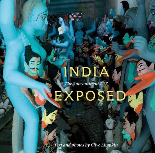Ceramic statues of Hindu goddess Kali, in blue, INDIA EXPOSED The Subcontinent A-Z in yellow and white font to centre.