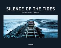 Rail road and embankment on Wadden Sea, wagon with lamp on front, on black cover of 'Silence of the Tides', by Lannoo Publishers.