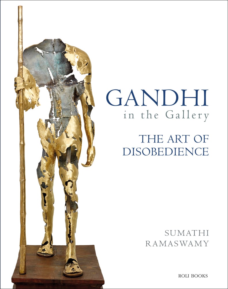 Bronze statue on plinth, ERASER PRO, 2012 by L.N.Tallur, white cover, GANDHI in the Gallery in blue font to right.