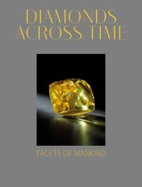 Grey book cover of 'Diamonds Across Time, Facets of Mankind' featuring a large yellow sapphire to center. Published by World Diamond Museum.