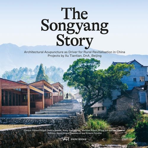 Row of wood buildings, steps leading up towards hilly landscape, The Songyang Story in black font above.