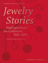 Red filter on jewelry piece, on cover of 'Jewelry Stories Highlights from the Collection 1947-2019'. by Arnoldsche Art Publishers.