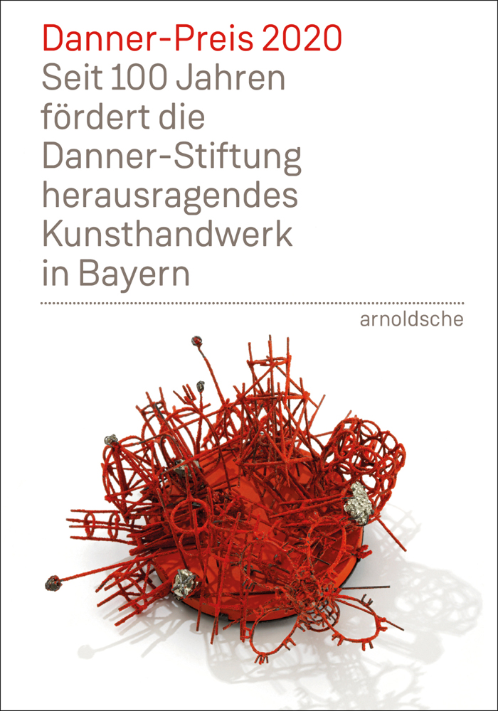 Red spiky sculpture, white cover, Danner Preis 2020 Seit 100 Jahren fordert die Danner Stiftung herausragendes kunsthandwerk in Bayern in red and grey font above.