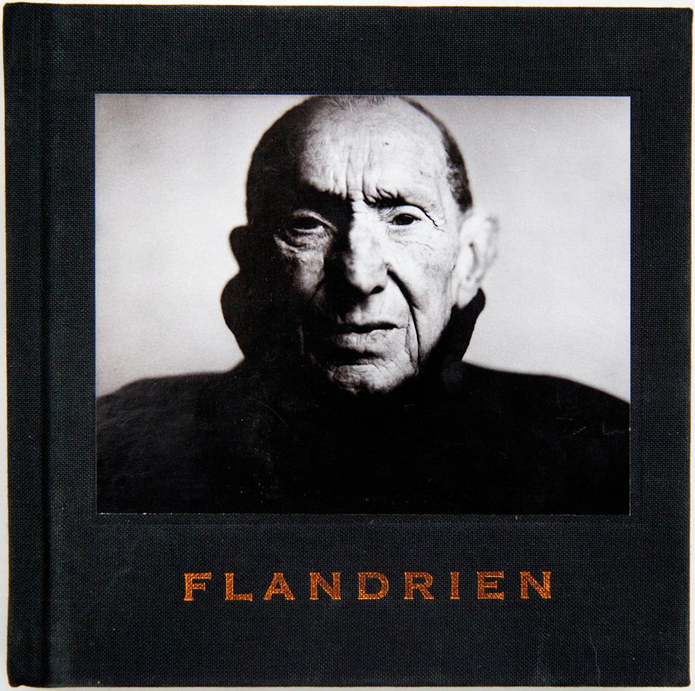 Belgian racing cyclist Alberic 'Briek' Schotte in black duffel coat, on black cover of 'Flandrien', by Hannibal Books.