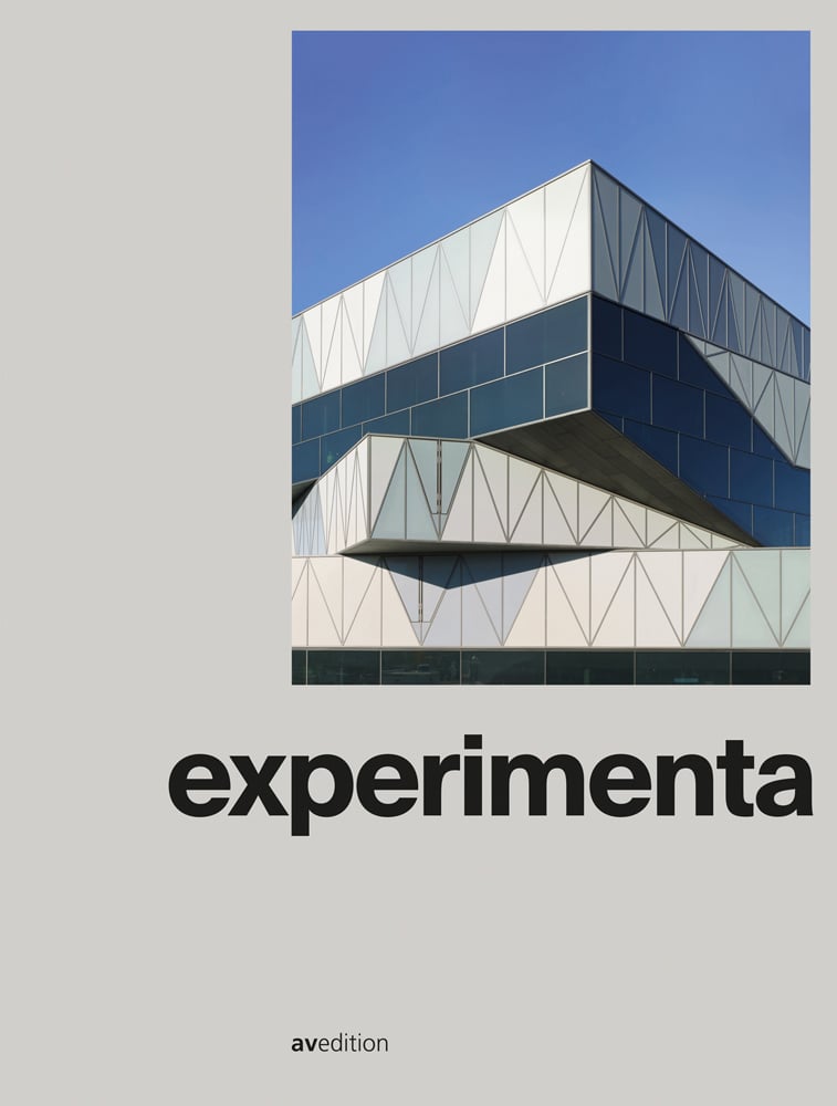 Experimenta Science Centre with glass exterior, on cover of 'experimenta, A science center in a new dimension', by Avedition Gmbh.