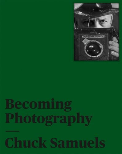 Green cover with black and white photo to top right of man behind box camera and Becoming Photography Chuck Samuels in black font to lower portion
