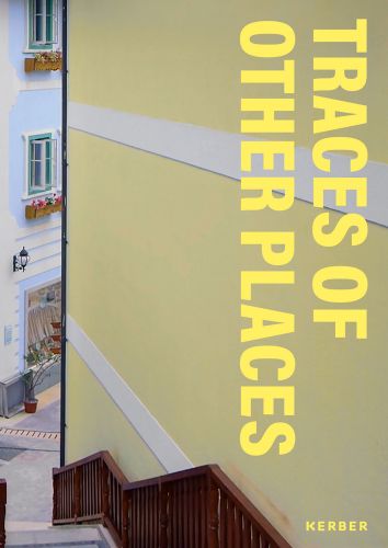 High angle perspective looking down exterior steps with yellow wall and Sebastian Acker Traces of Other Places in pale yellow font