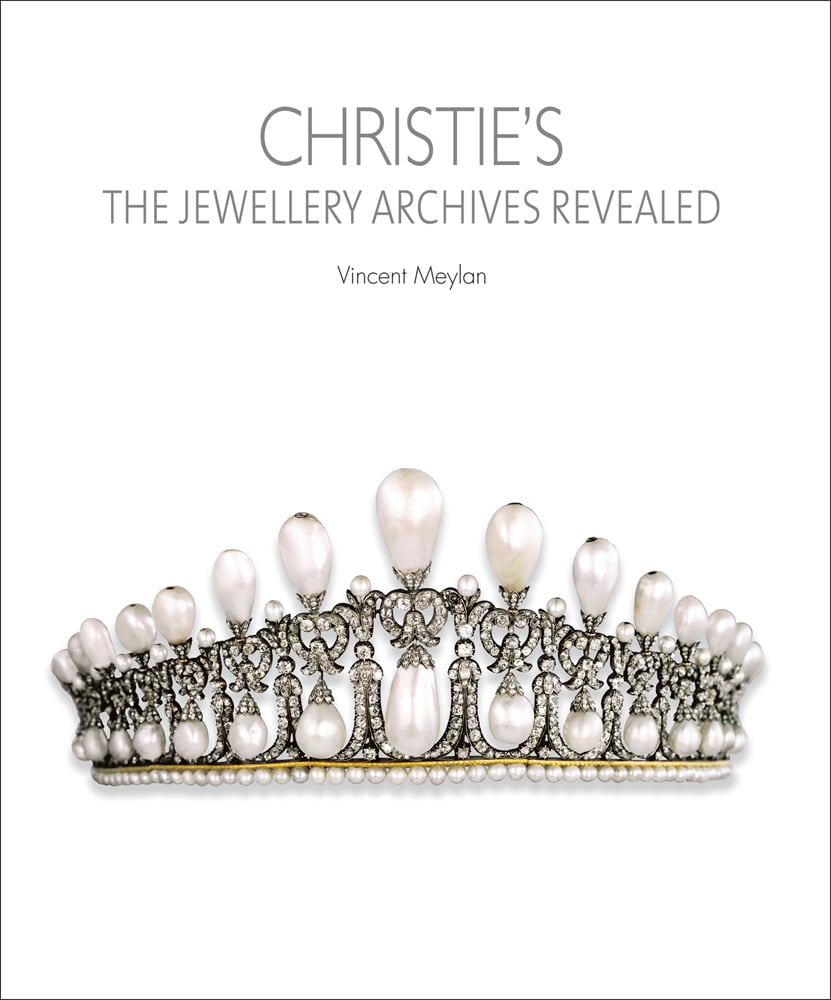 White cover with ornate diamond and pearl crown with Christie's The Jewellery Archives Revealed in grey font above