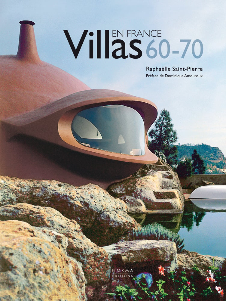 Spaceship-like terracotta villa building with domed glass window, on cover of 'Villas 60-70 en France', by Editions Norma.