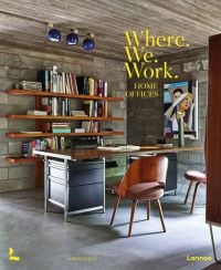 Industrial interior work space with desk, shelves and retro light fixtures, on cover of 'Where We Work, Home Offices', by Lannoo Publishers.