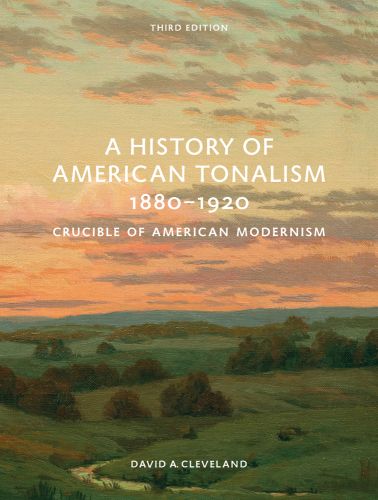 Serene landscape painting of river disappearing between green land with an orange sunset sky and A History of American Tonalism Crucible of American Modernism in white capital letters