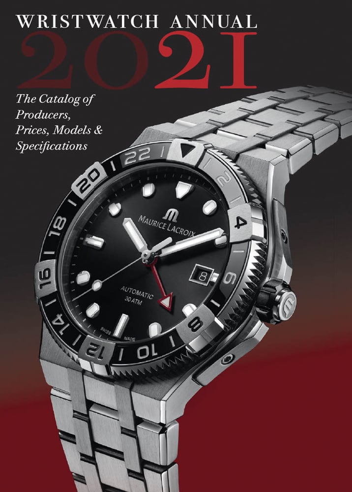 Black red Ombre cover with silver mechanical watch and Wristwatch Annual 2021 in white and red font above