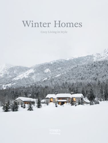 Snowy mountainous landscape with large trees and 2 residential buildings below with Winter Homes Cozy Living in Style in grey font above