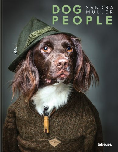 Brown Small Münsterländer dog wearing green hat and knitted jumper, DOG PEOPLE, in pale green font to top right.
