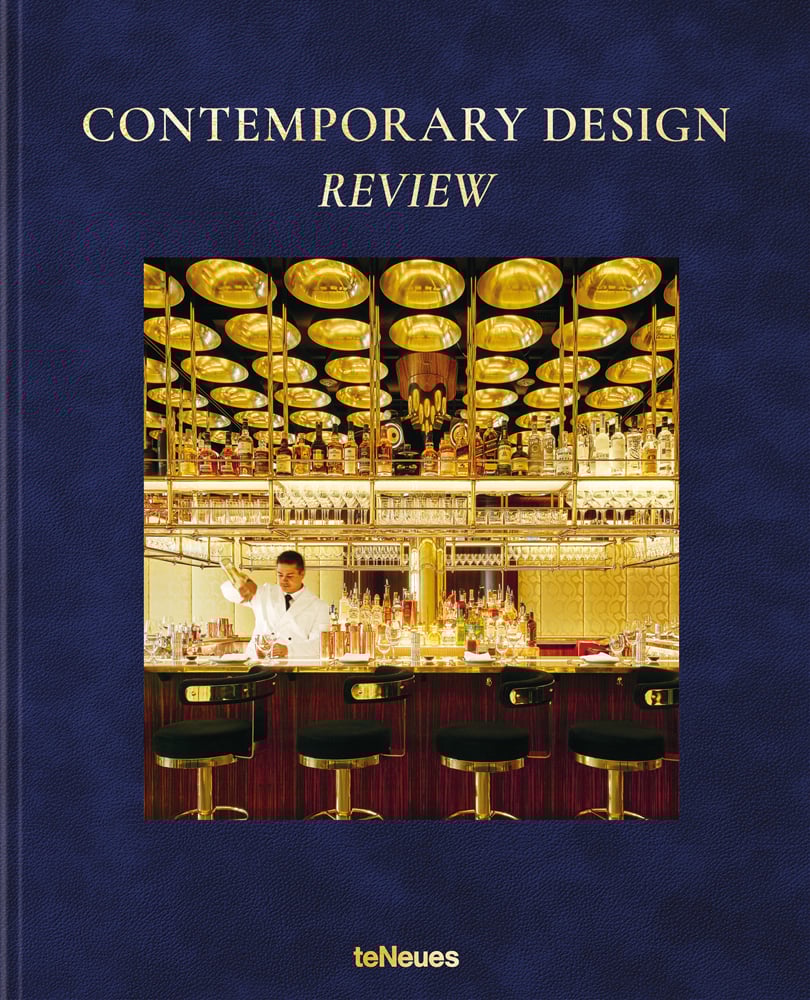 Book cover of Contemporary Design Review, with the luxury interior of Isabel London bar, with bartender pouring cocktail. Published by teNeues Books.