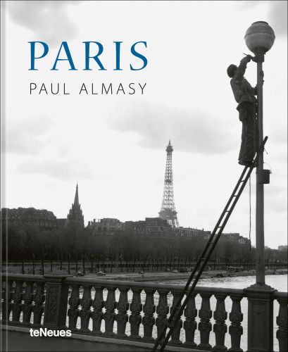 Man painting light on Pont Alexandre III bridge, Eiffel tower behind, PARIS, PAUL ALMASY, in blue, and grey font to upper left of cover.